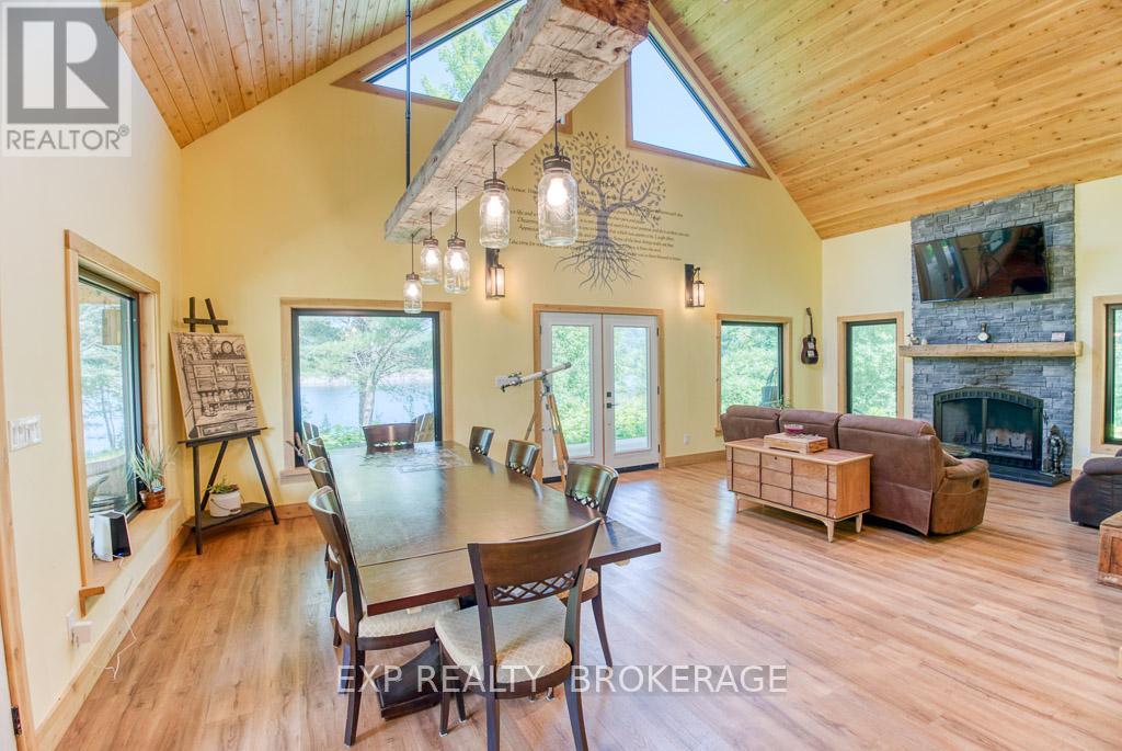 1249 Waters Edge Lane, Frontenac (Frontenac Centre), ON - Indoor With Fireplace