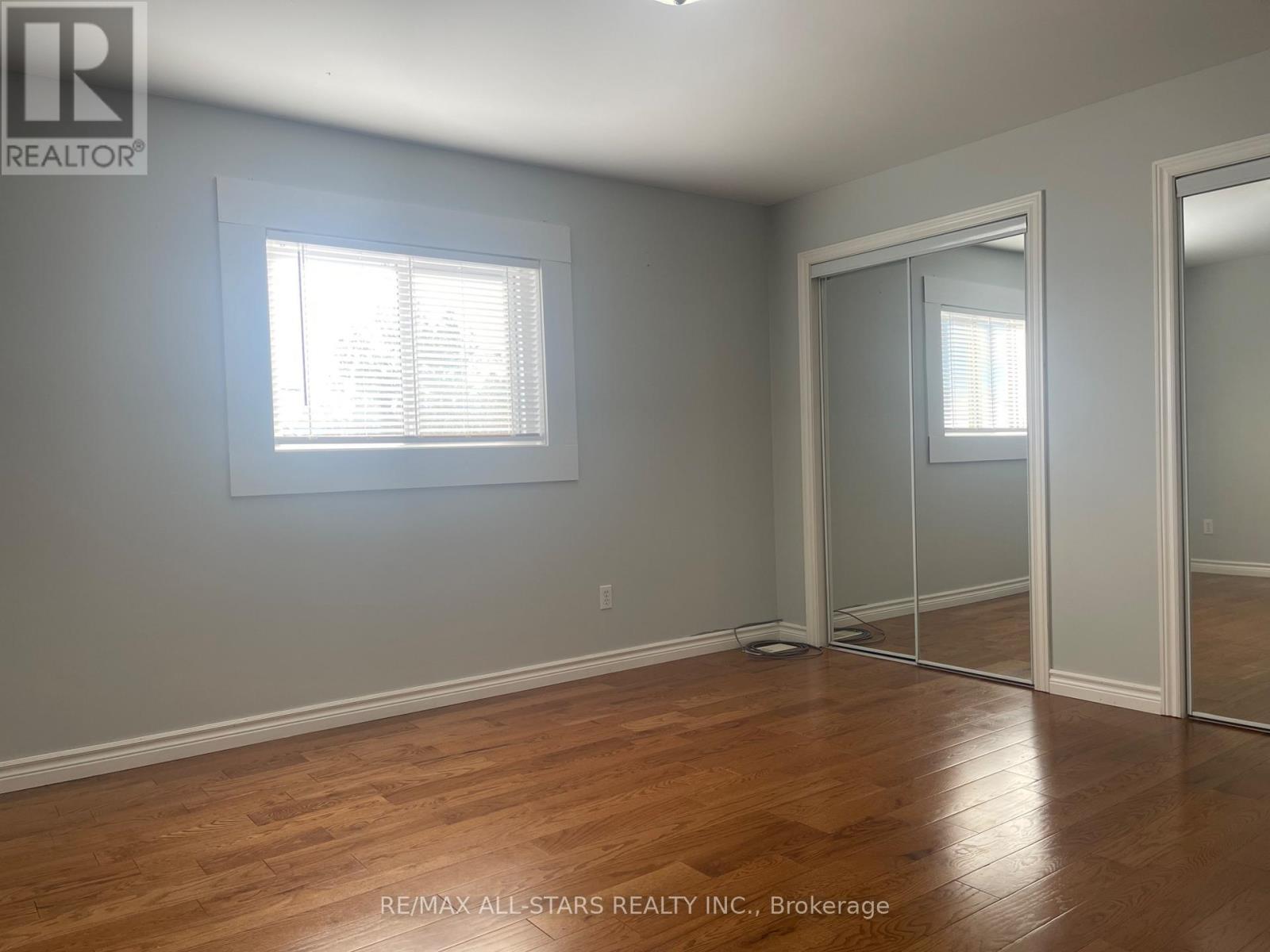 Primary Bedroom - Hardwood Floors - Main Floor - 39 Mcgibbon Boulevard, Kawartha Lakes (Lindsay), ON - Indoor Photo Showing Other Room