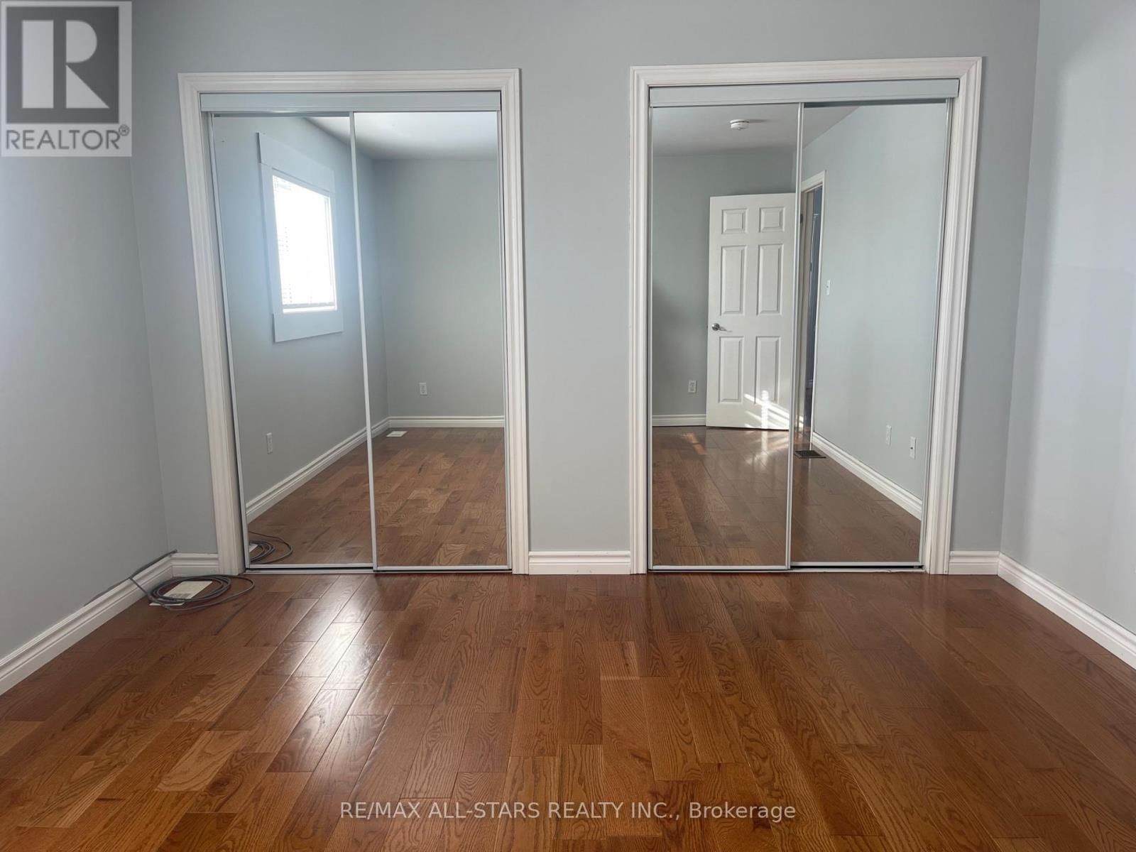 His / her closets - Main Floor - 39 Mcgibbon Boulevard, Kawartha Lakes (Lindsay), ON - Indoor Photo Showing Other Room