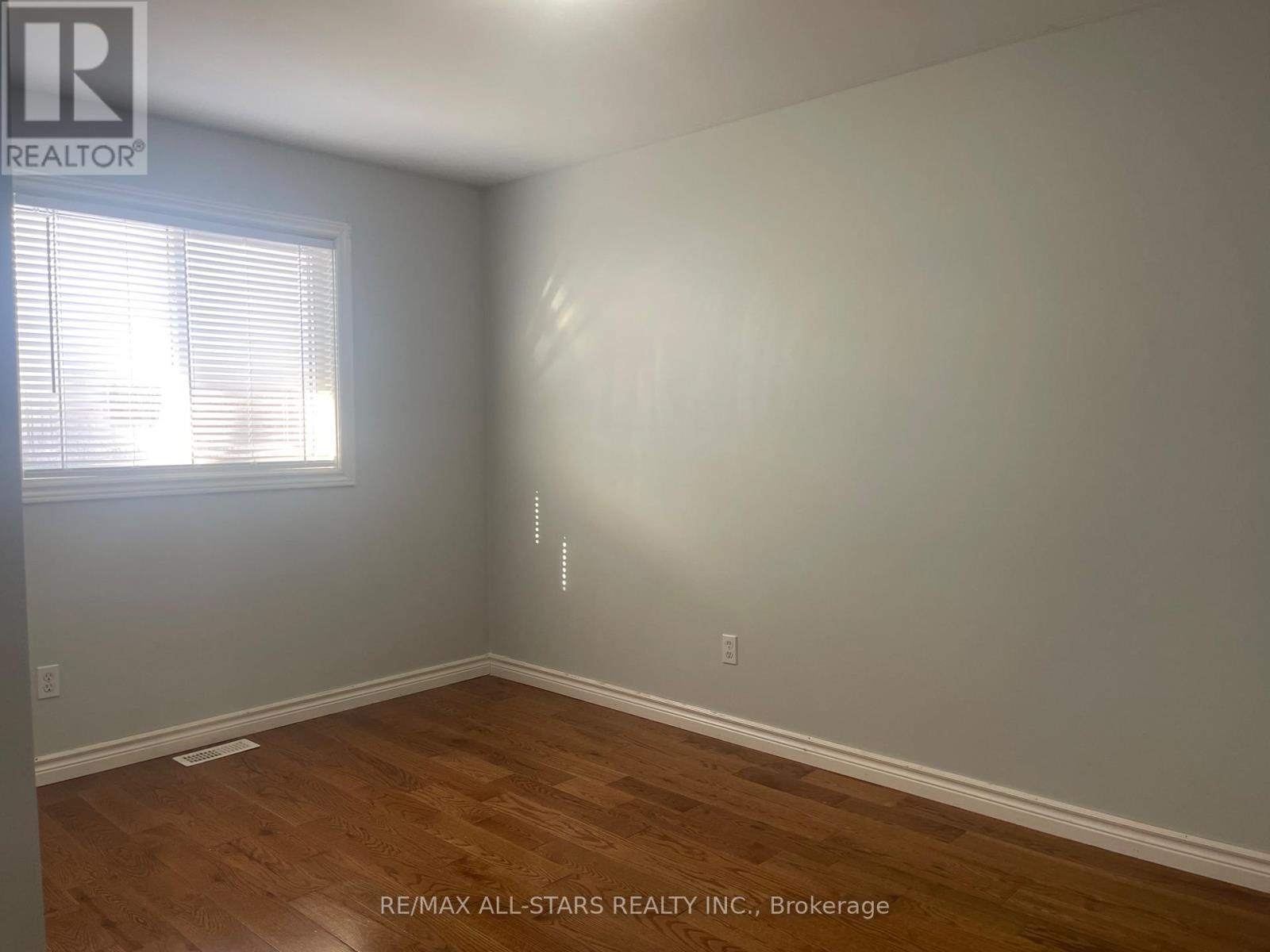 2nd Bedroom - also wood floors - Main Floor - 39 Mcgibbon Boulevard, Kawartha Lakes (Lindsay), ON - Indoor Photo Showing Other Room