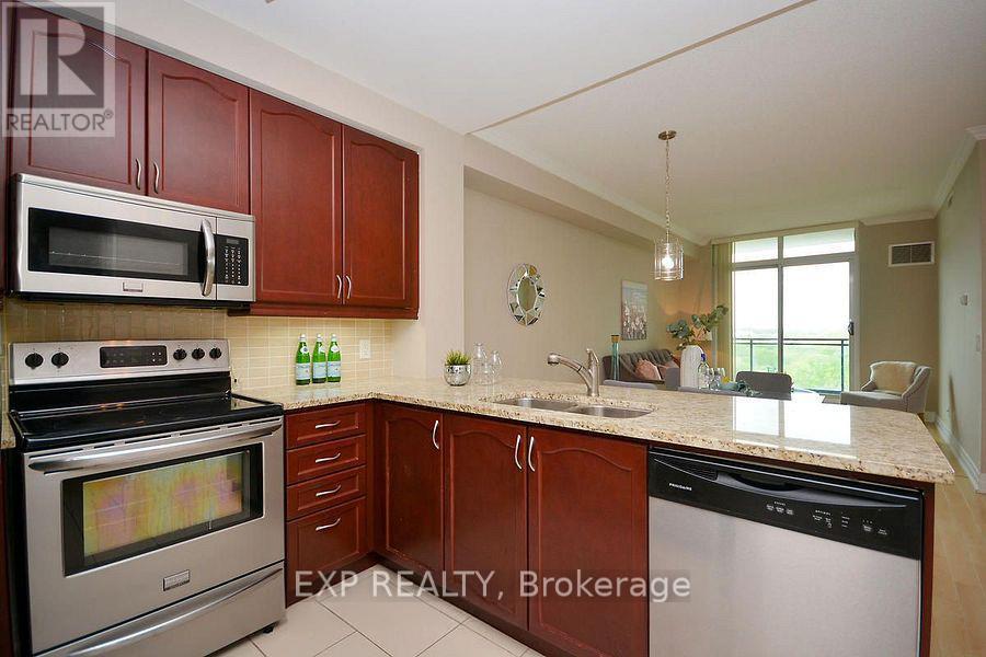 1007 - 100 John Street, Brampton, ON - Indoor Photo Showing Kitchen With Stainless Steel Kitchen With Double Sink