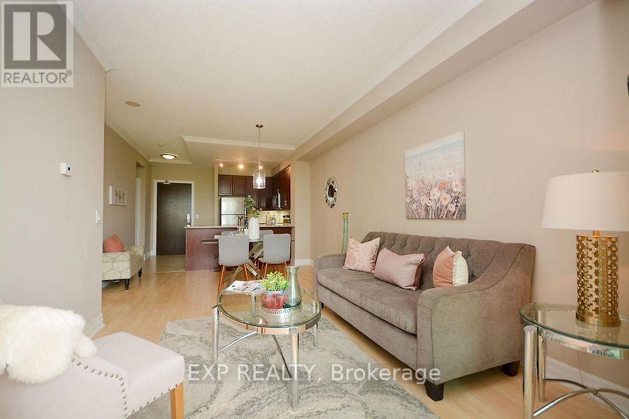 1007 - 100 John Street, Brampton, ON - Indoor Photo Showing Living Room