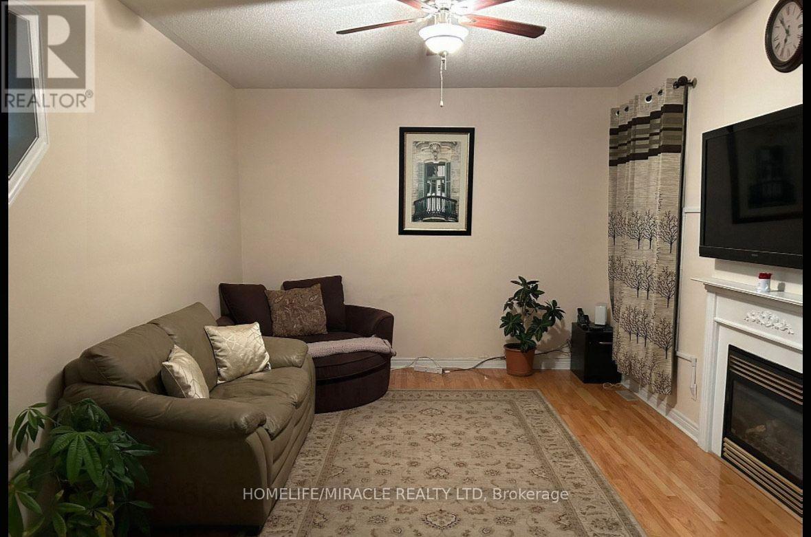 20 Midnightsun Trail, Brampton, ON - Indoor Photo Showing Other Room With Fireplace