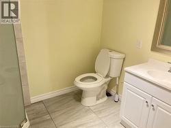 Bathroom with vanity and a shower stall -