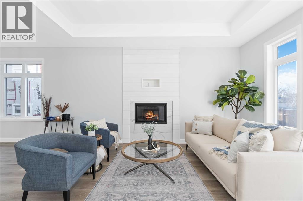 219 Essex Street, Sarnia, ON - Indoor Photo Showing Living Room With Fireplace