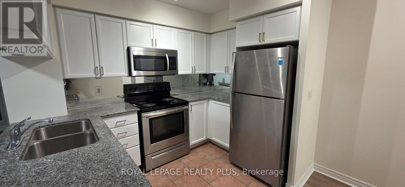 2311 - 4080 Living Arts Drive, Mississauga, ON - Indoor Photo Showing Kitchen With Stainless Steel Kitchen With Double Sink