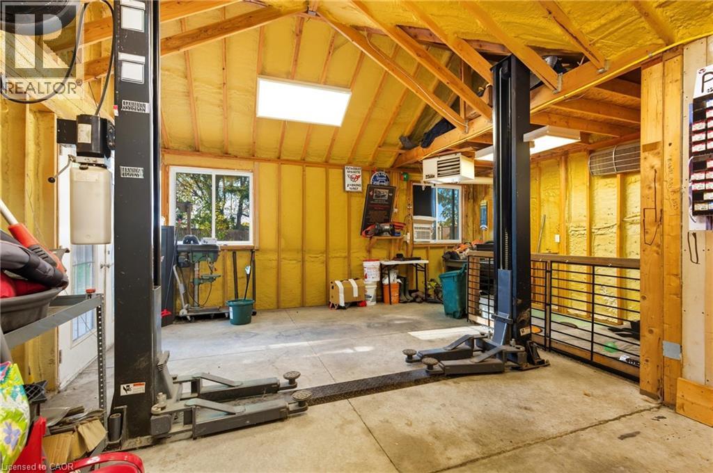Garage with a heating unit - 17 Carmen Avenue, Hamilton, ON - Indoor