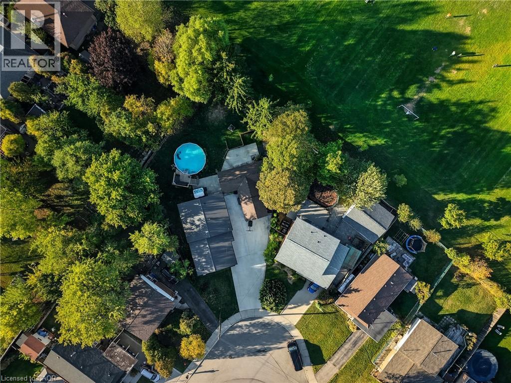 Aerial overview of property's location with a pool area - 17 Carmen Avenue, Hamilton, ON - Outdoor With View