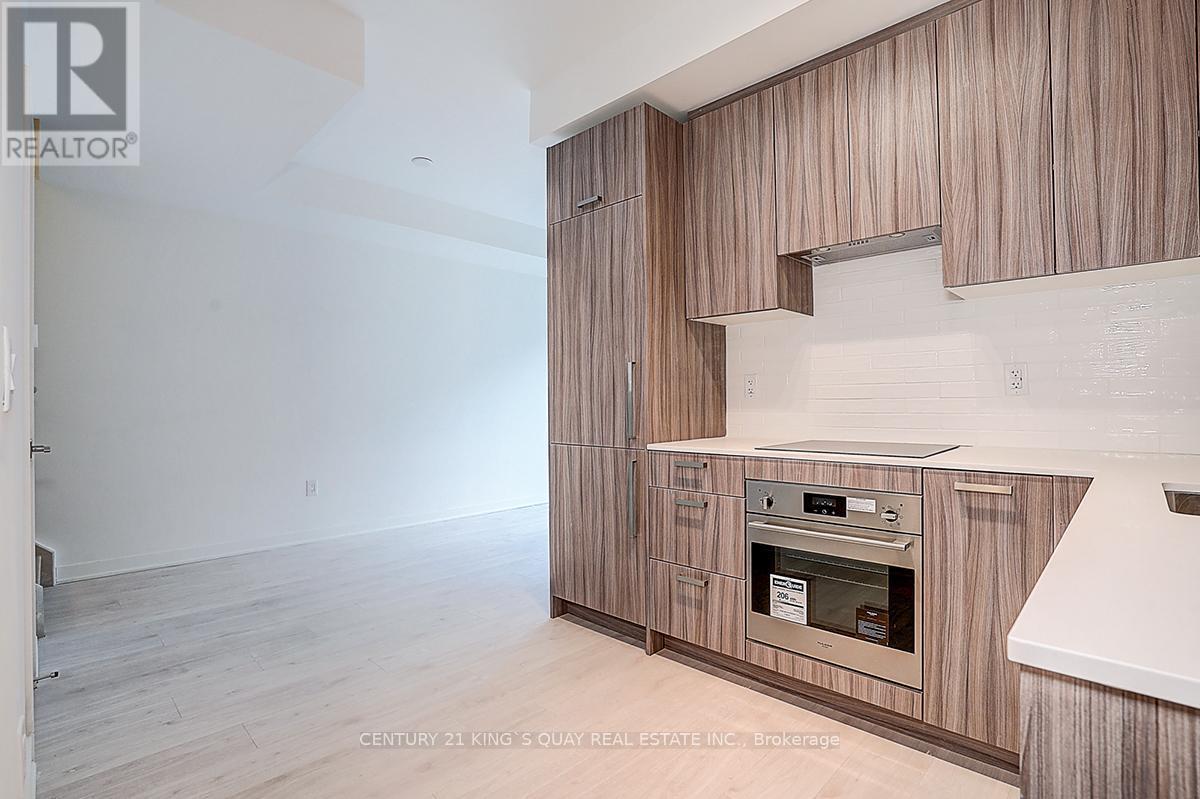 92 - 71 Curlew Drive, Toronto, ON - Indoor Photo Showing Kitchen