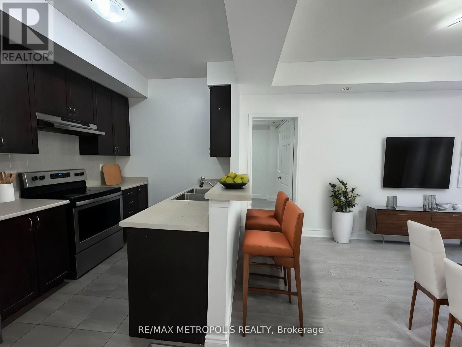 294 - 250 Sunny Meadow Boulevard, Brampton, ON - Indoor Photo Showing Kitchen With Double Sink