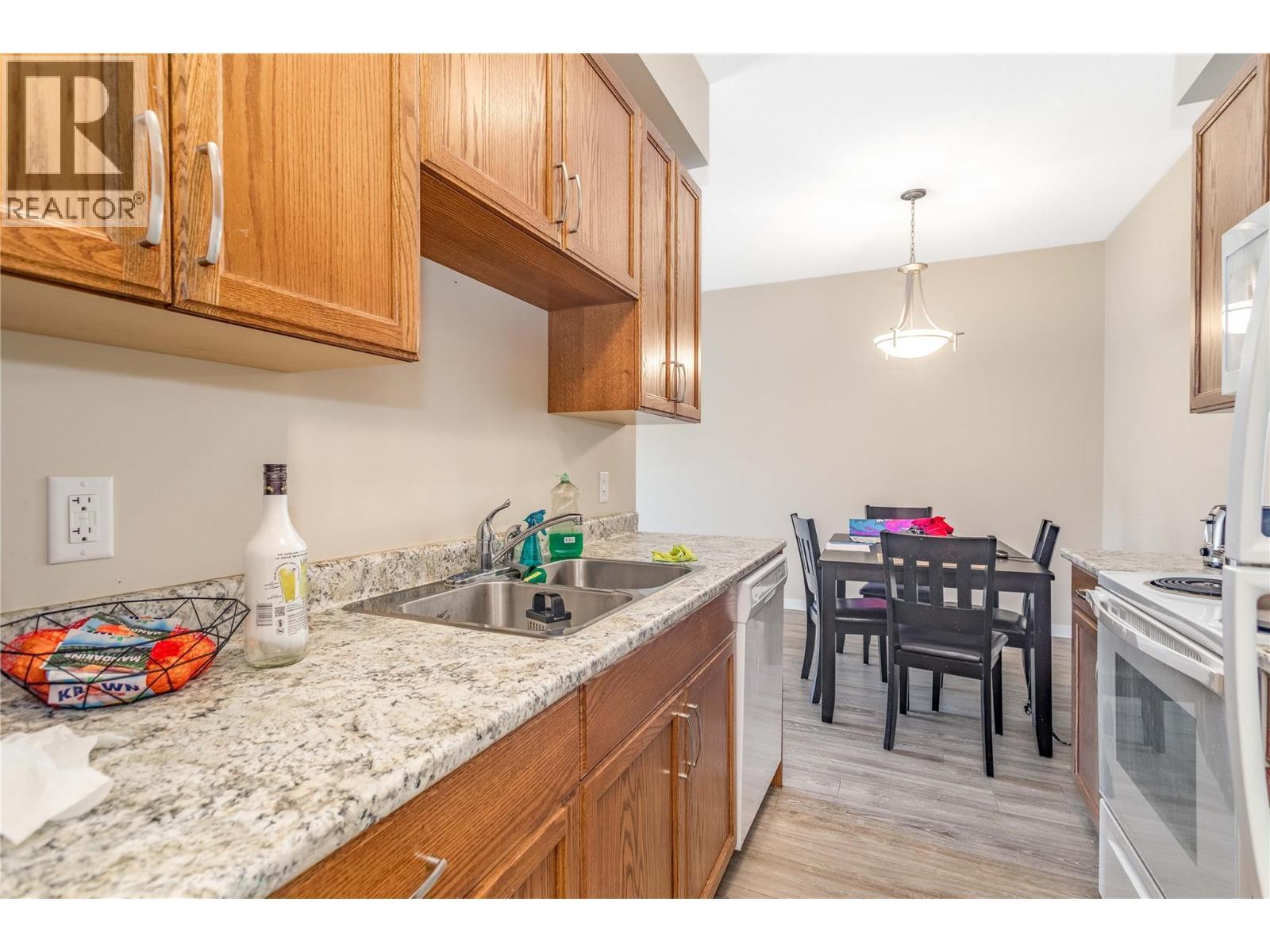 205 Highway 33 E, Kelowna, BC - Indoor Photo Showing Kitchen With Double Sink