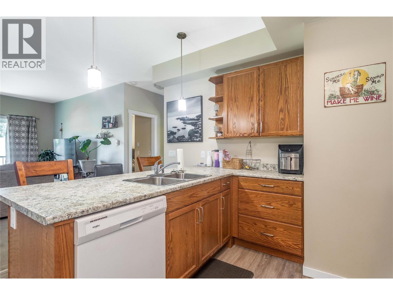 205 Highway 33 E, Kelowna, BC - Indoor Photo Showing Kitchen With Double Sink