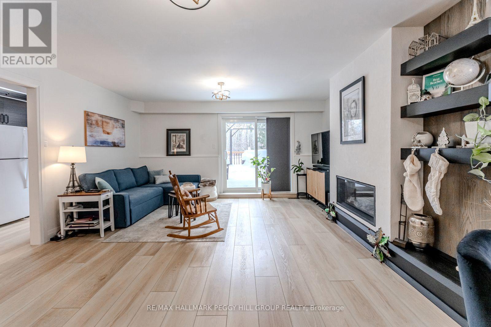 59 Lankin Boulevard, Orillia, ON - Indoor Photo Showing Living Room With Fireplace