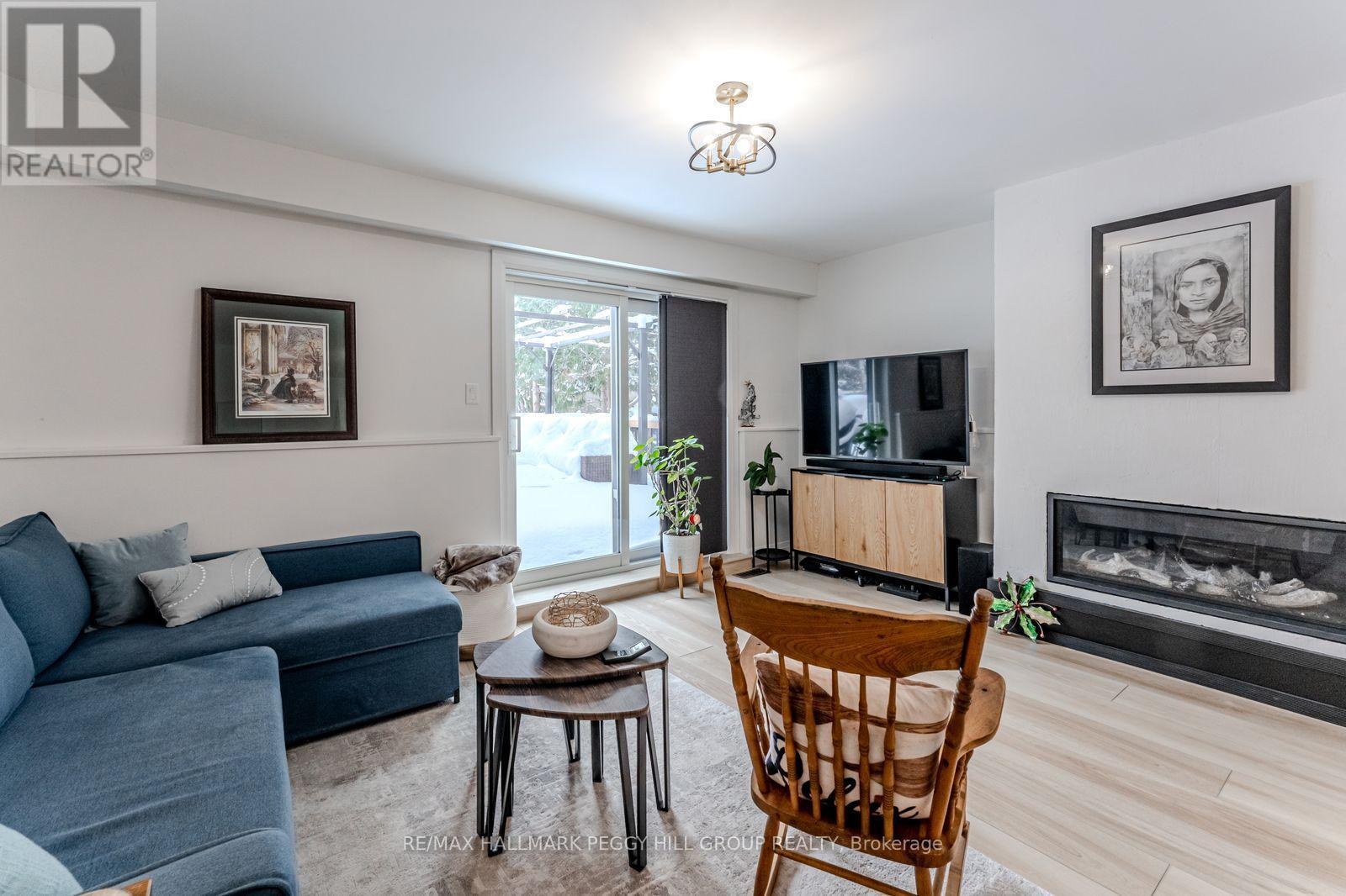 59 Lankin Boulevard, Orillia, ON - Indoor Photo Showing Living Room With Fireplace