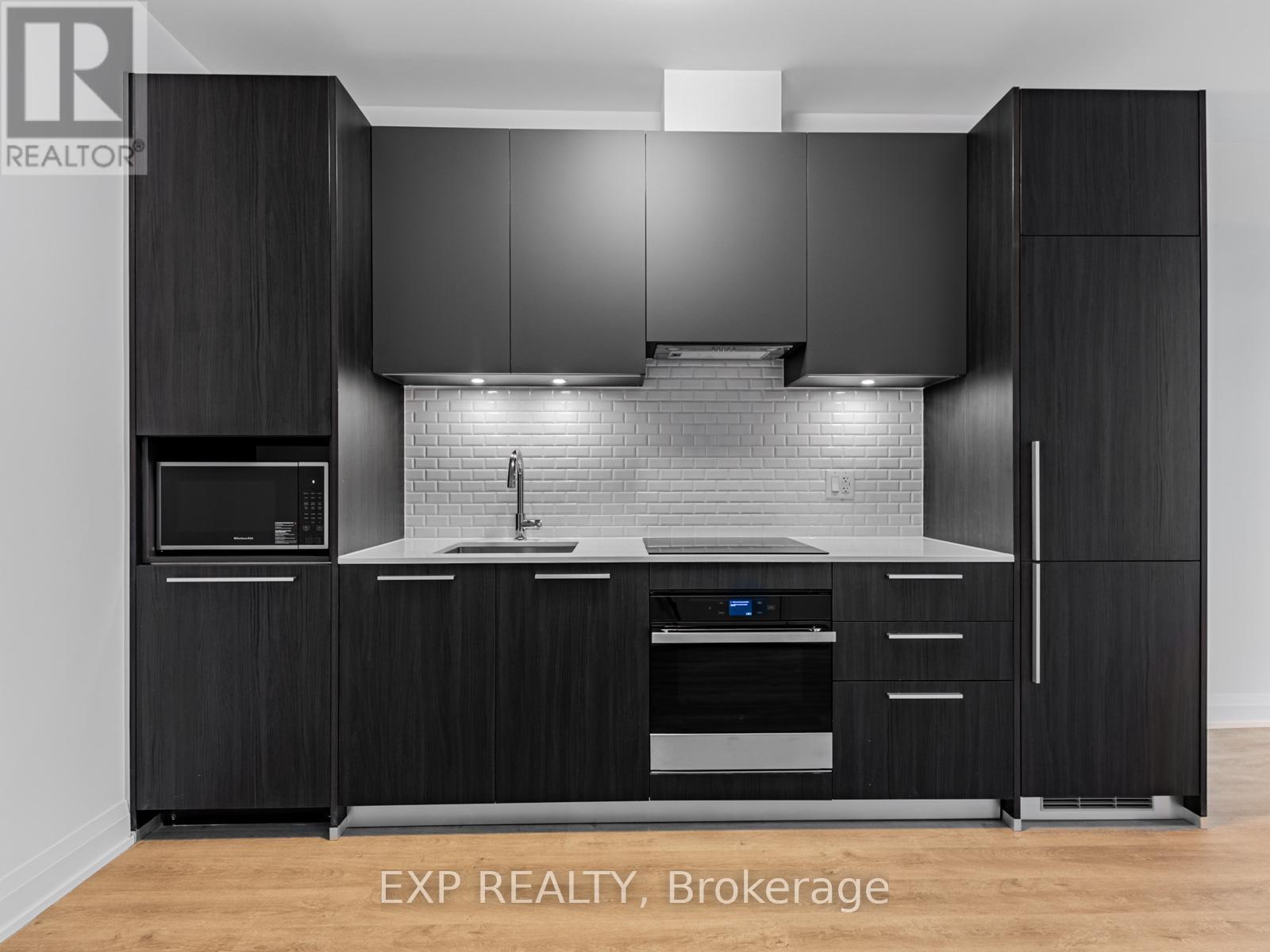 1402 - 65 Broadway Avenue, Toronto, ON - Indoor Photo Showing Kitchen With Upgraded Kitchen