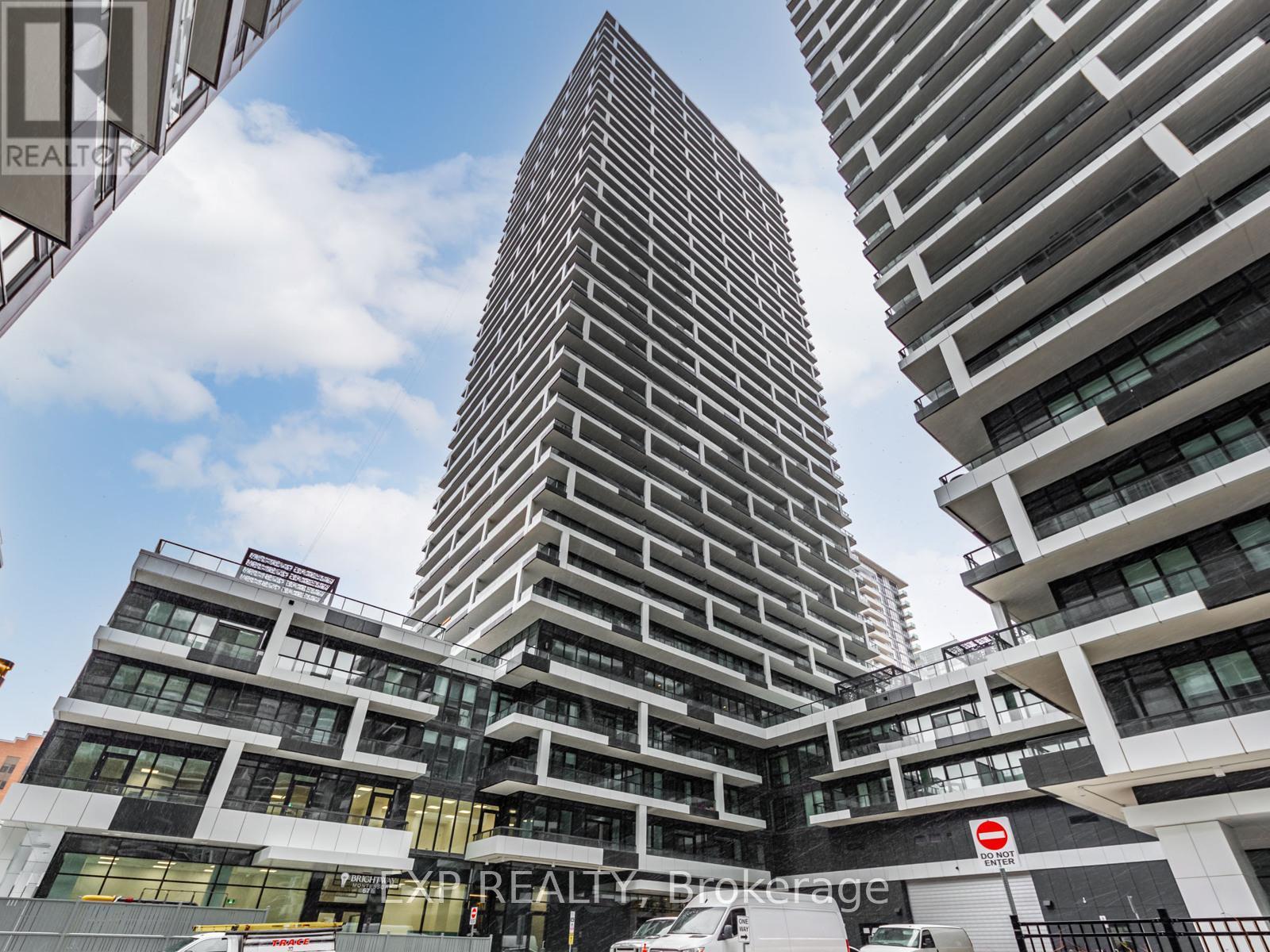 1402 - 65 Broadway Avenue, Toronto, ON - Outdoor With Facade