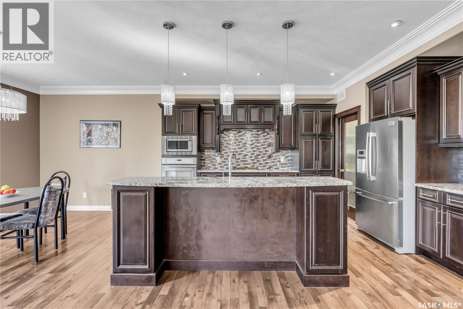 3969 Sandhill Crescent, Regina, SK - Indoor Photo Showing Kitchen With Stainless Steel Kitchen With Upgraded Kitchen