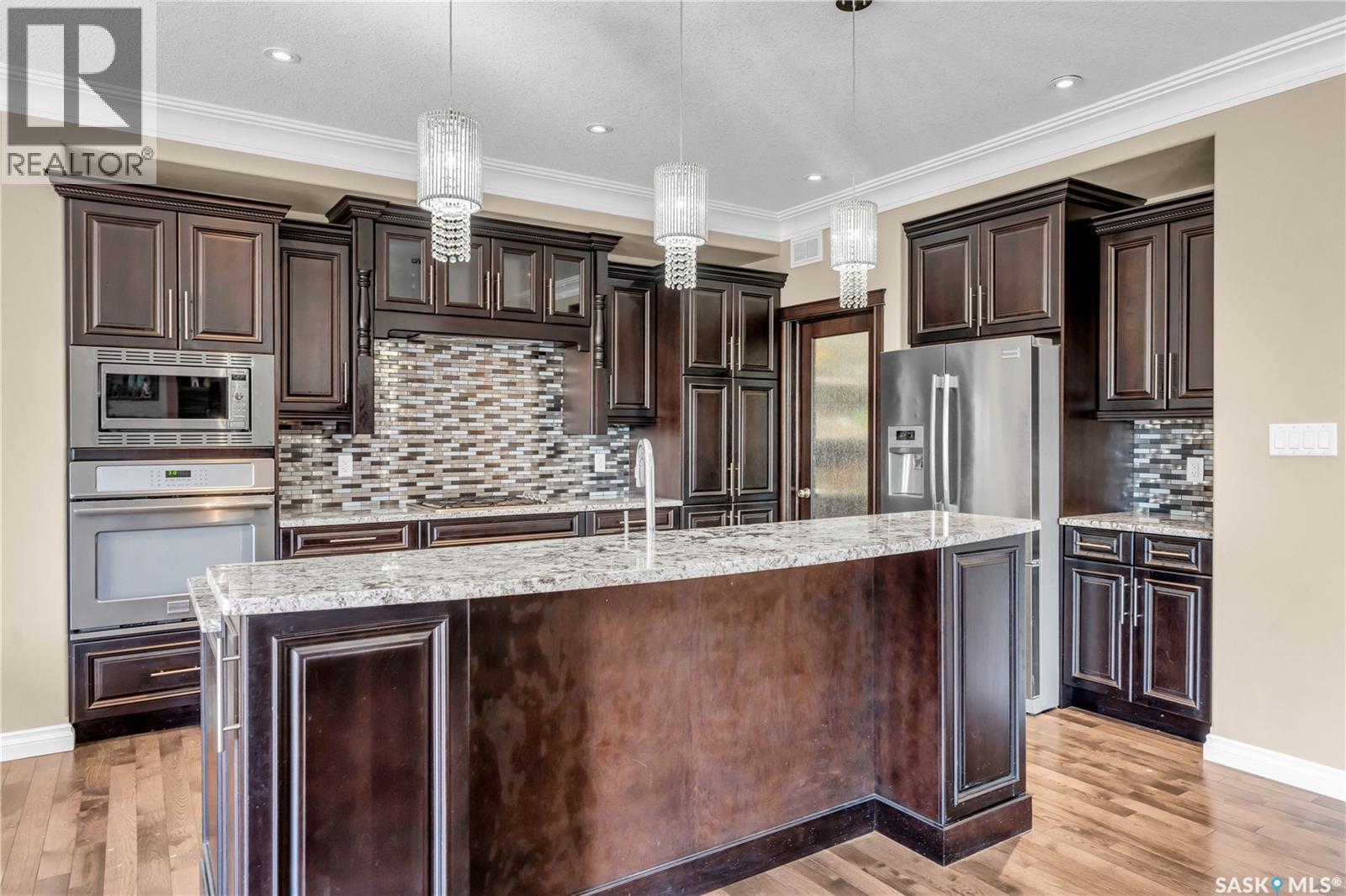 3969 Sandhill Crescent, Regina, SK - Indoor Photo Showing Kitchen With Stainless Steel Kitchen With Upgraded Kitchen