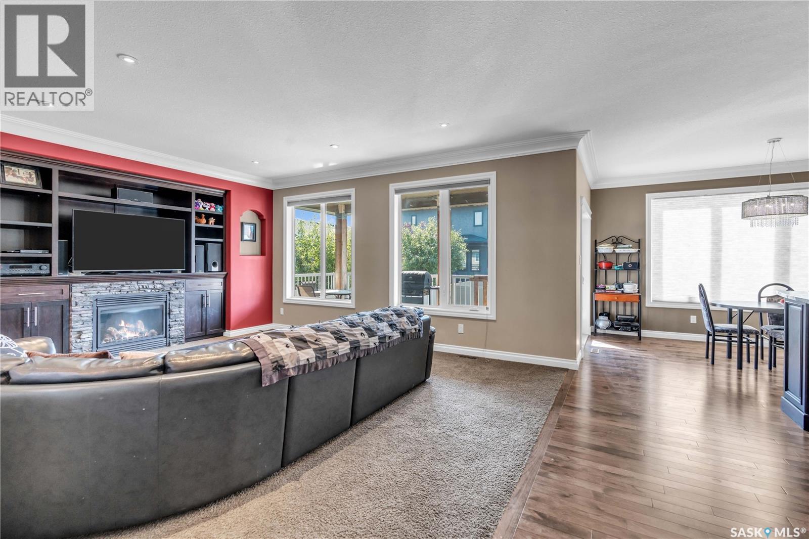 3969 Sandhill Crescent, Regina, SK - Indoor Photo Showing Living Room With Fireplace