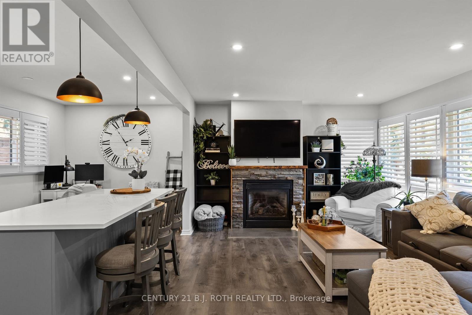1551 Gill Road, Springwater, ON - Indoor Photo Showing Living Room With Fireplace