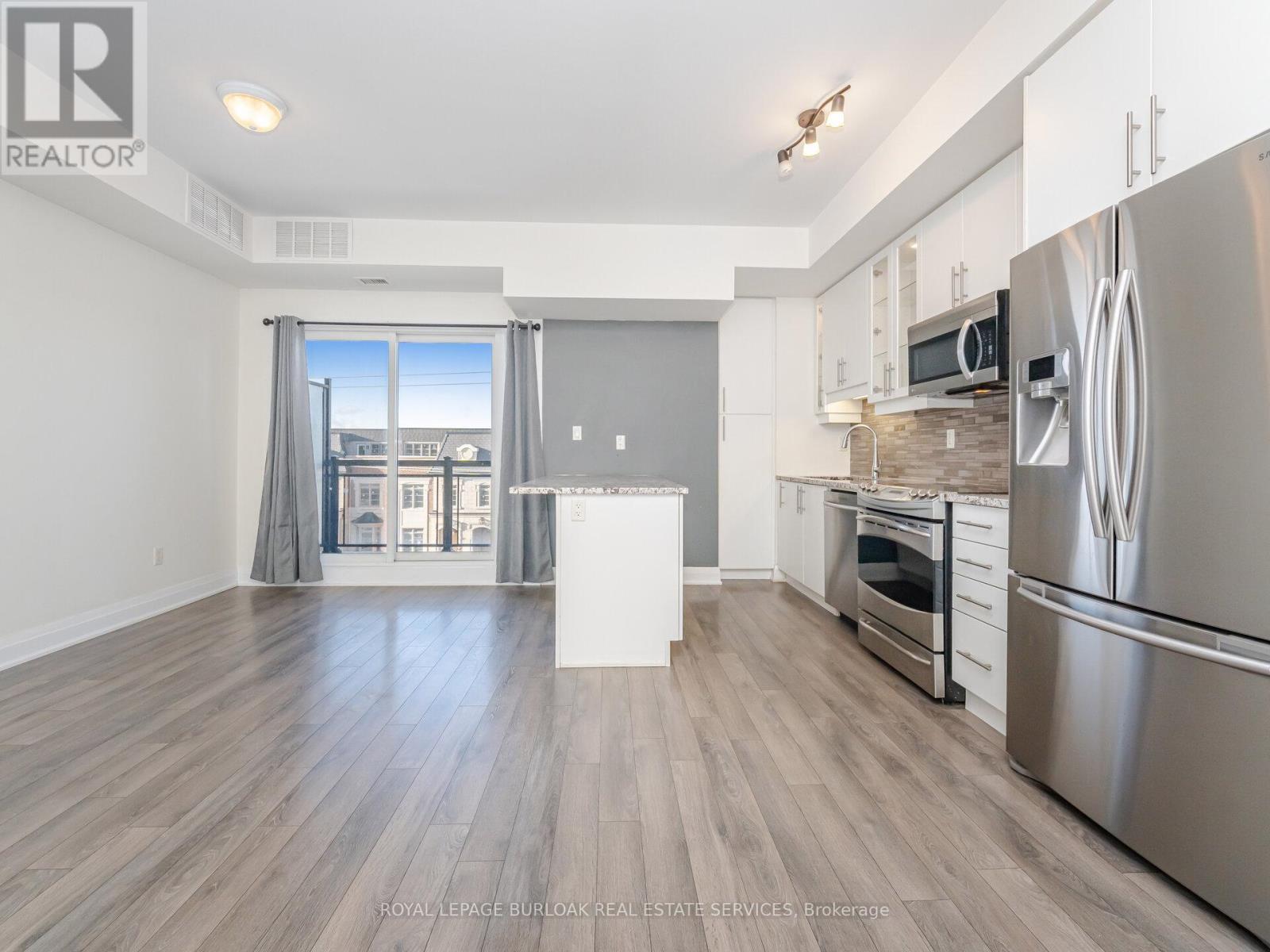418 - 128 Garden Drive, Oakville, ON - Indoor Photo Showing Kitchen With Stainless Steel Kitchen