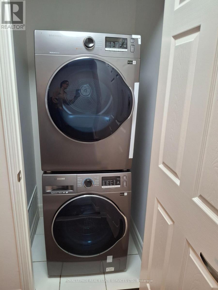 Laundry Closet - 2nd Floor - 15 - 8 Windermere Avenue, Toronto, ON - Indoor Photo Showing Laundry Room