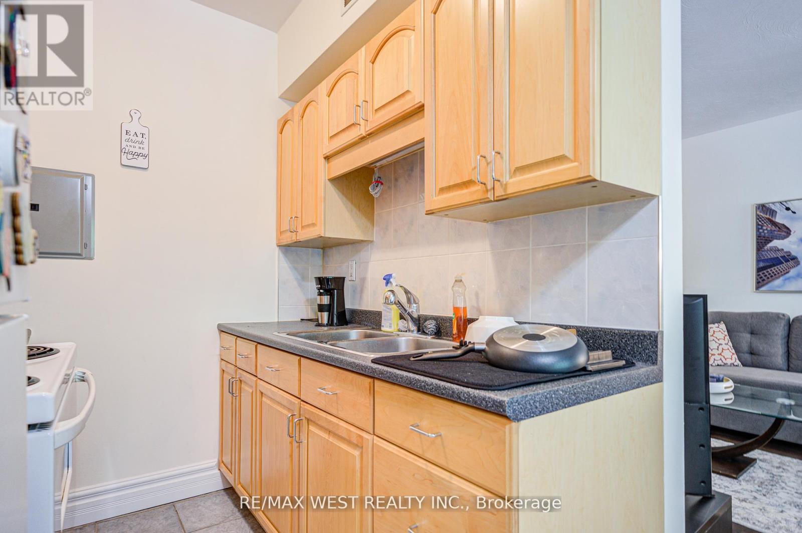 104 - 101 Queen Street S, Hamilton, ON - Indoor Photo Showing Kitchen With Double Sink