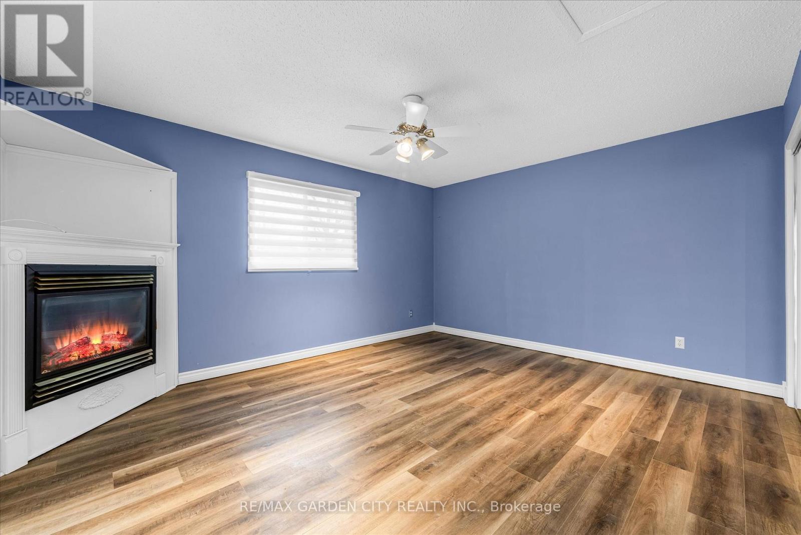 17 Marilyn Street, Grimsby, ON - Indoor Photo Showing Other Room With Fireplace