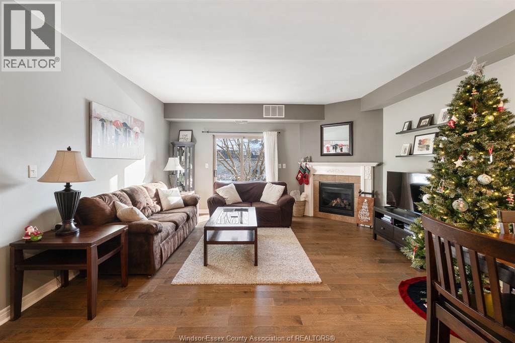 5995 Ellis Street Unit# 202, Lasalle, ON - Indoor Photo Showing Living Room With Fireplace