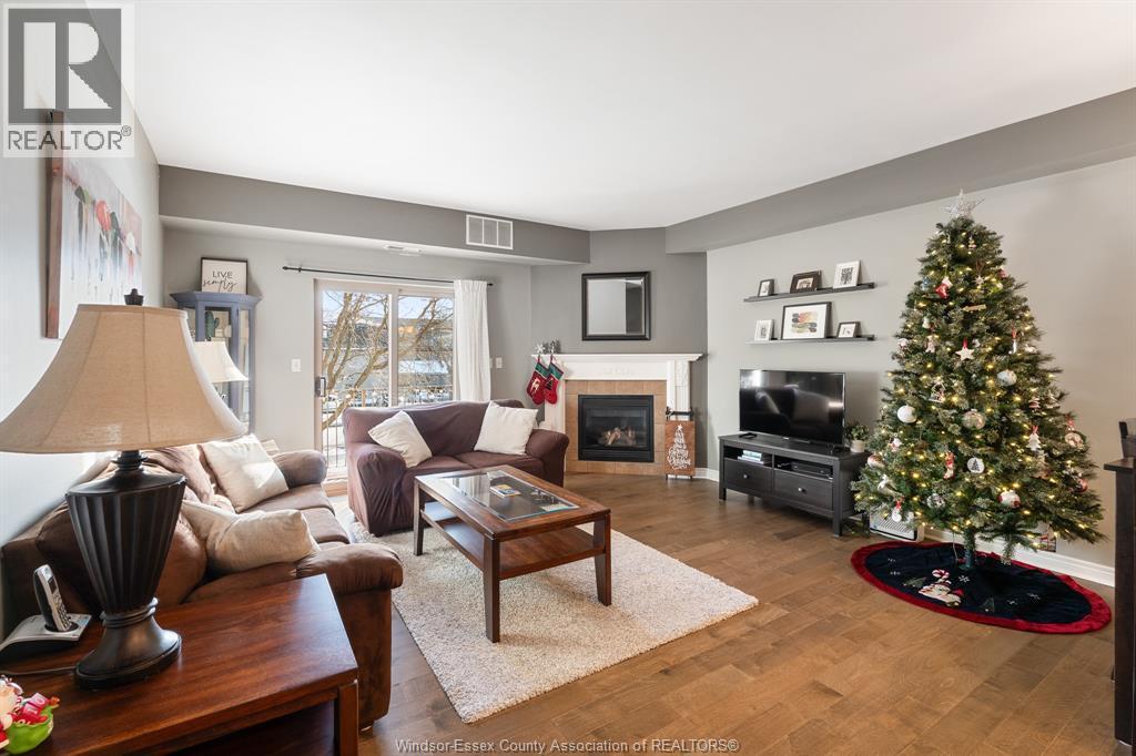 5995 Ellis Street Unit# 202, Lasalle, ON - Indoor Photo Showing Living Room With Fireplace