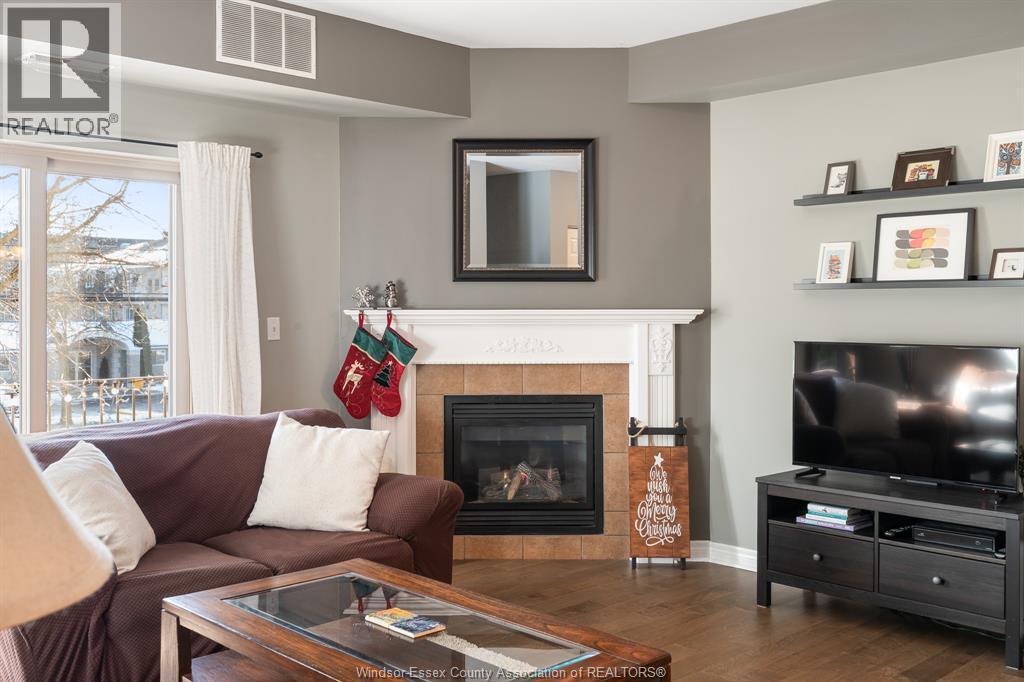 5995 Ellis Street Unit# 202, Lasalle, ON - Indoor Photo Showing Living Room With Fireplace