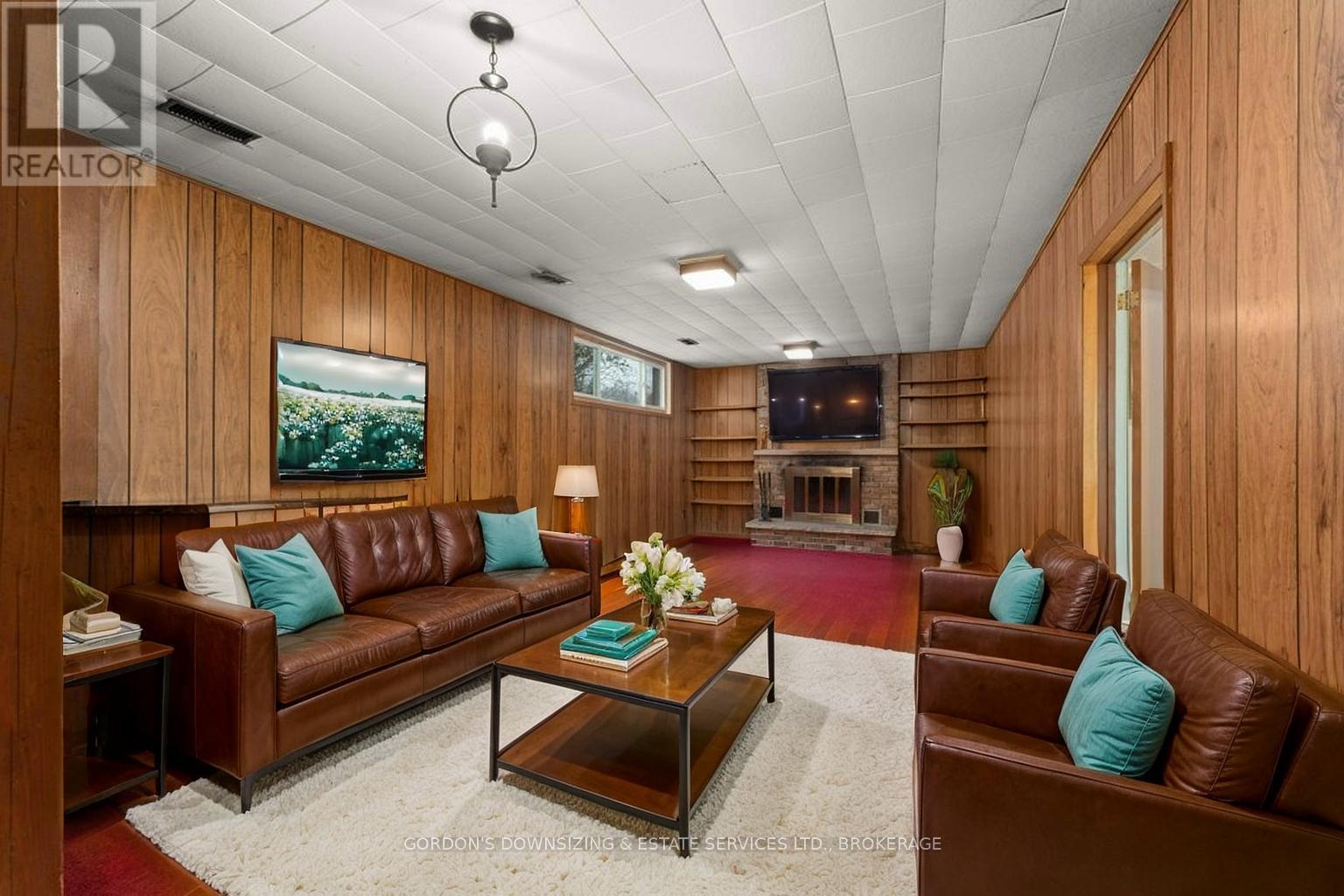 873 Danbury Road, Kingston (South Of Taylor-Kidd Blvd), ON - Indoor Photo Showing Living Room With Fireplace