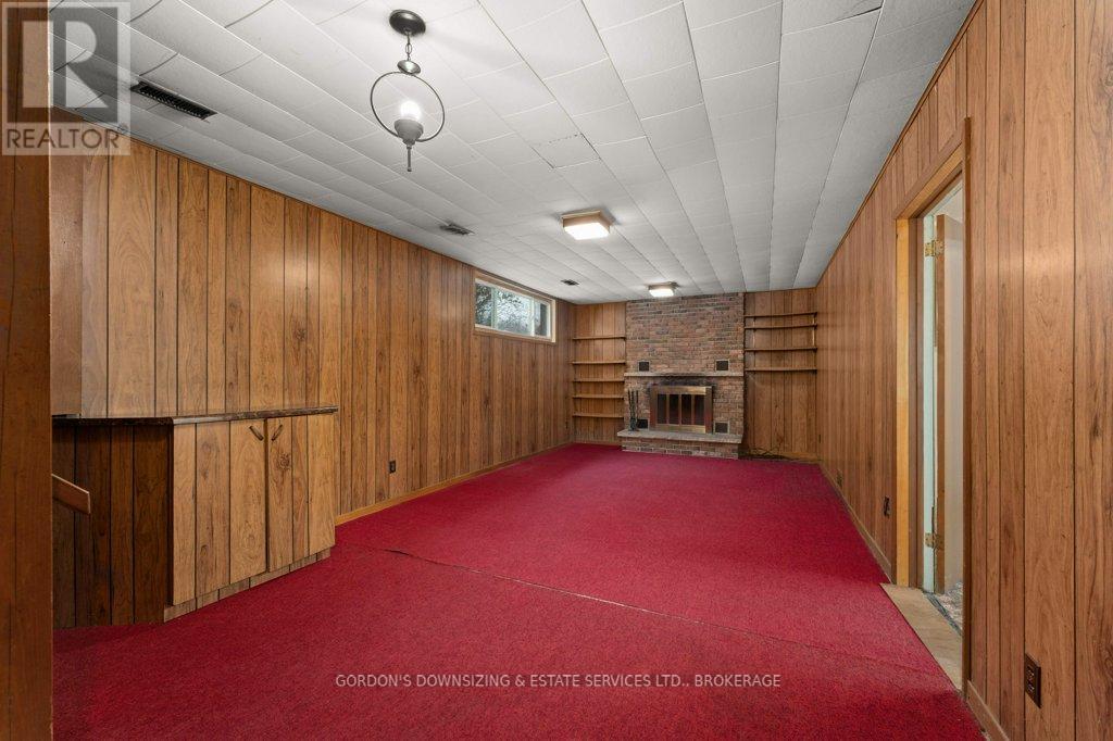 873 Danbury Road, Kingston (South Of Taylor-Kidd Blvd), ON - Indoor Photo Showing Other Room With Fireplace