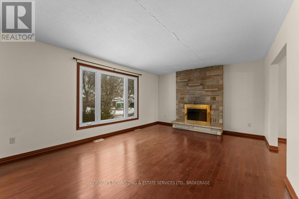 873 Danbury Road, Kingston (South Of Taylor-Kidd Blvd), ON - Indoor Photo Showing Living Room With Fireplace