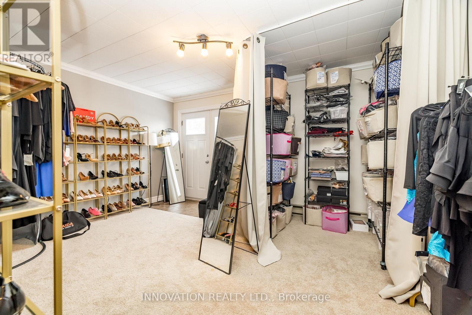 Finished rec/family room with walkout to backyard - 58 - 122 Castlegreen Private, Ottawa, ON