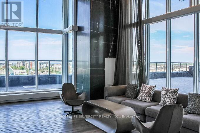 709 - 2481 Taunton Road, Oakville, ON - Indoor Photo Showing Living Room
