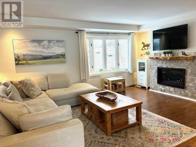 4511 Beaver Avenue, Hanmer, ON - Indoor Photo Showing Living Room With Fireplace