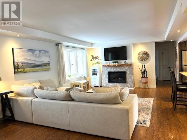 4511 Beaver Avenue, Hanmer, ON - Indoor Photo Showing Living Room With Fireplace