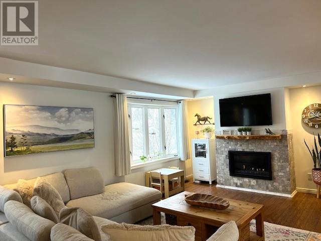 4511 Beaver Avenue, Hanmer, ON - Indoor Photo Showing Living Room With Fireplace