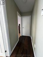 hallway to primary bedroom -