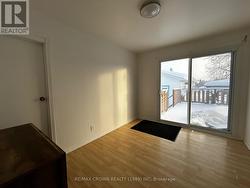 Bedroom 2 with backyard deck access -