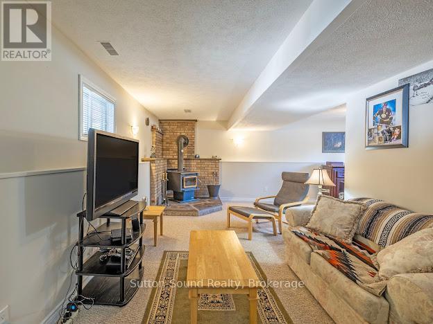 240135 Wilcox Side Road, Georgian Bluffs, ON - Indoor With Fireplace