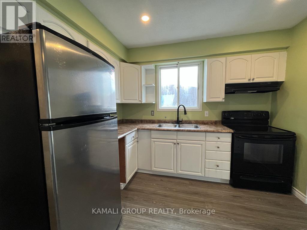 Spacious Kitchen With Storage - Main - 38 Mayfair Drive, Welland, ON - Indoor Photo Showing Kitchen With Double Sink
