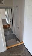 Walkdown to laundry room and garage entrance -