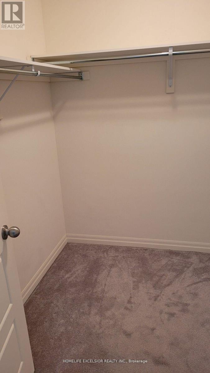 Primary BR W/I Closet - 192 Tango Crescent, Newmarket, ON - Indoor With Storage