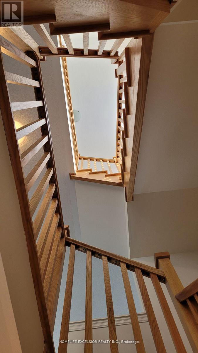 Beautiful stairs with wooden pegs - 192 Tango Crescent, Newmarket, ON - Indoor Photo Showing Other Room