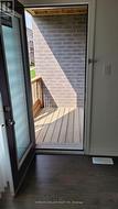 Access to deck from ground level family room -