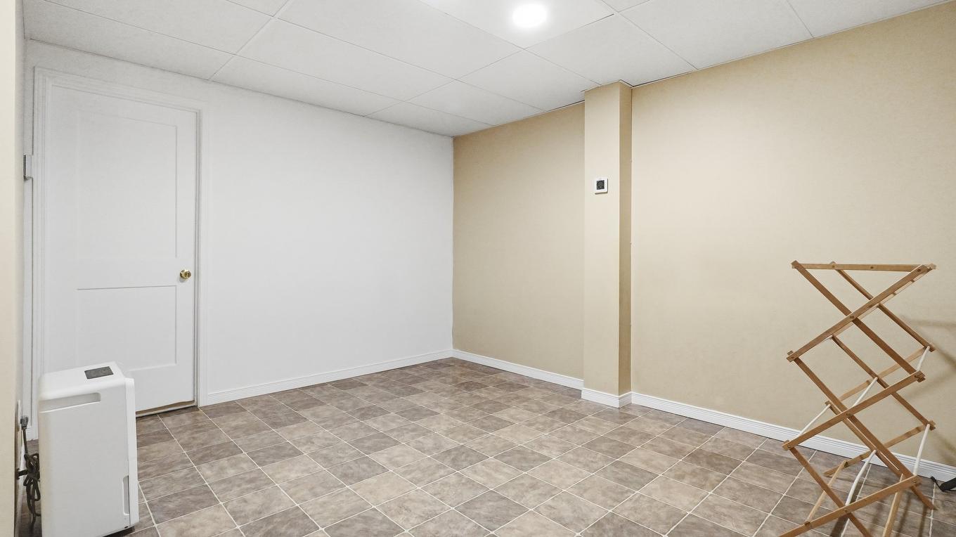 Chambre à coucher - 795 36E Rue, Saint-Georges, QC - Indoor Photo Showing Other Room