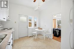 Side door access leads to backyard & front gate -