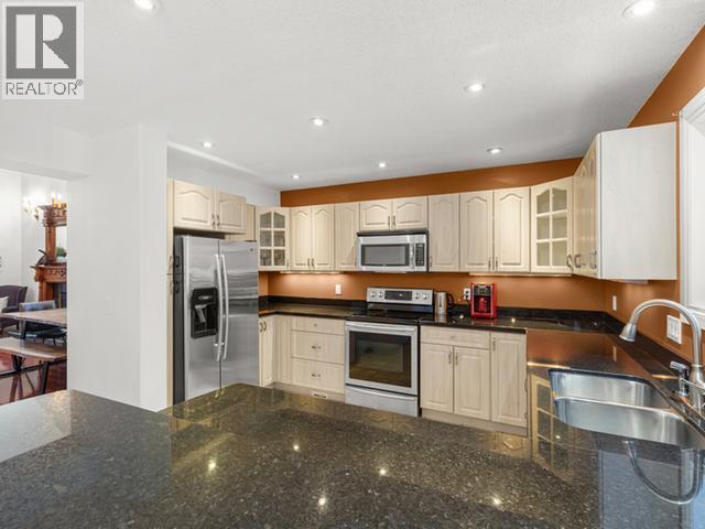 40 Stope Way, Whitehorse, YT - Indoor Photo Showing Kitchen With Double Sink